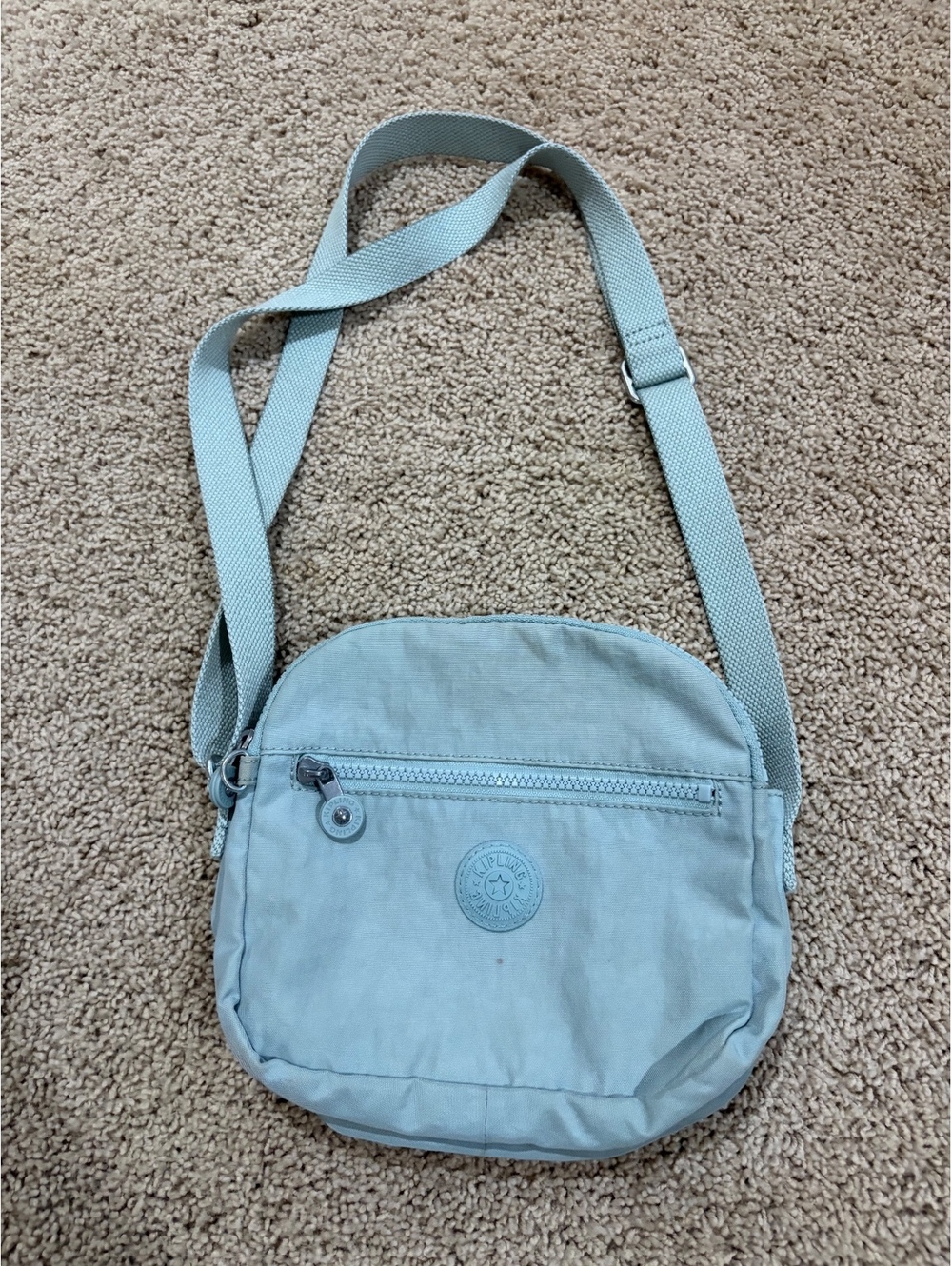 Teal light blue Kipling Keefe nylon crossbody bag purse front zippered pocket